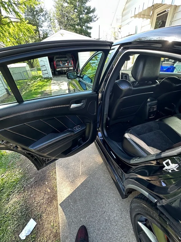 Professionally detailed Toyota interior with spotless brown leather seats and clean dashboard by Detailing Fever in Decatur, IL Mount Zion, IL